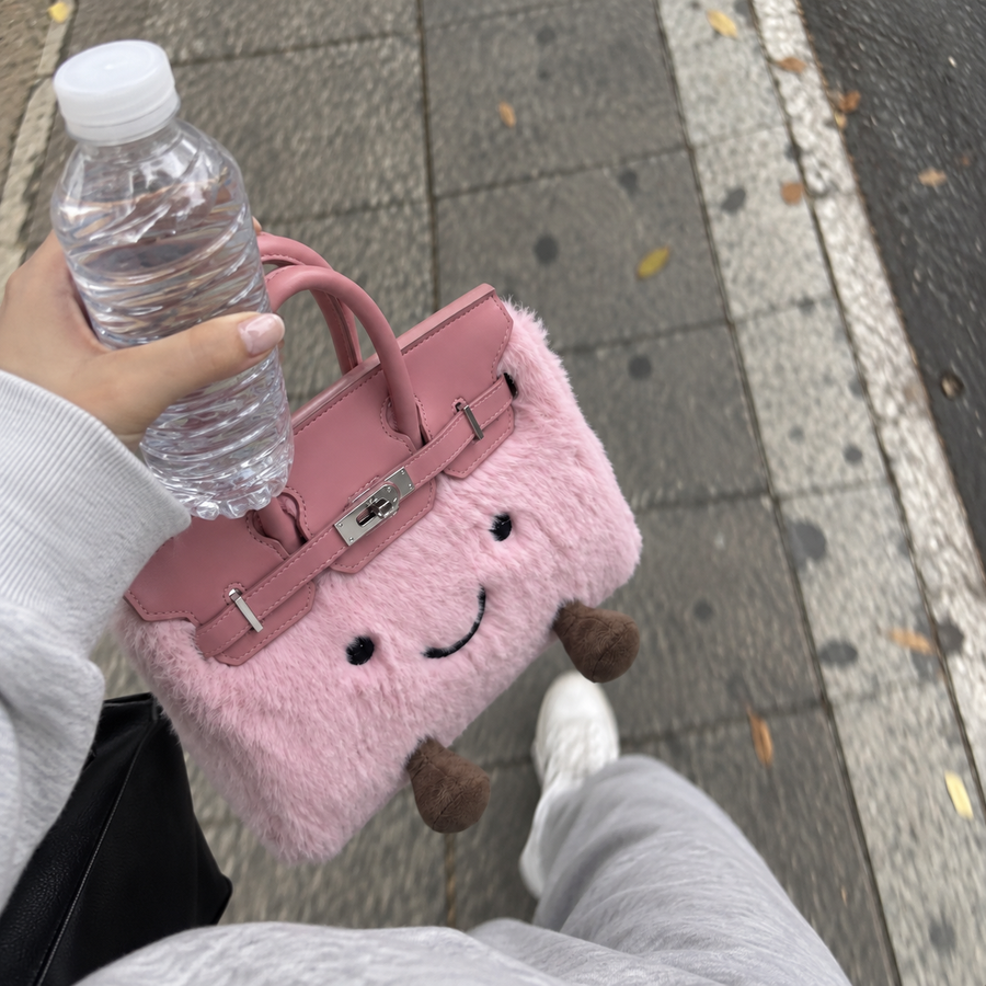 Lily M. <i style="font-weight: 400; color: #8F7A6E;">Chose Pinky</i>